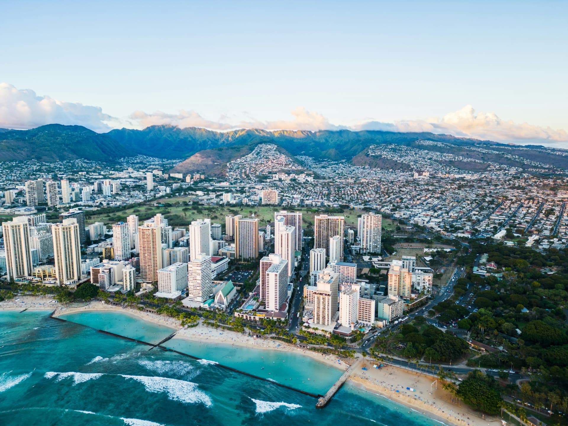 Honolulu shoreline at golden hour on the south shore of O'ahu — Alpha Omega Plumbing
